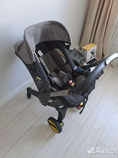 Коляска автокресло doona с базой isofix