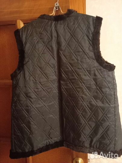 Меховая жилетка