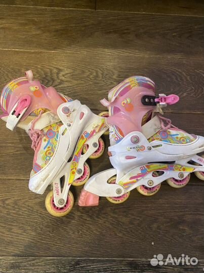 Роликовые коньки