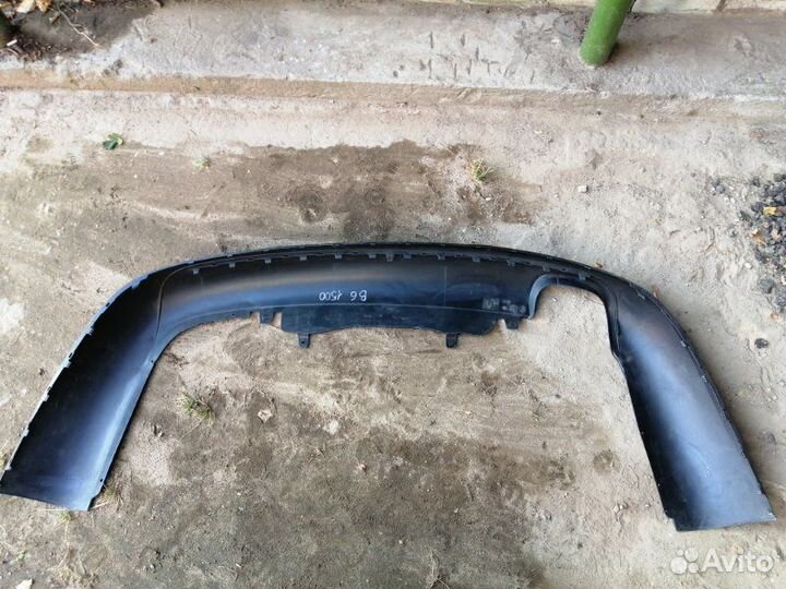 Спойлер (юбка) бампера задний Volkswagen Passat B6