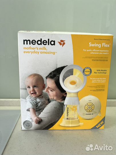 Молокоотсос электрический medela с пакетами