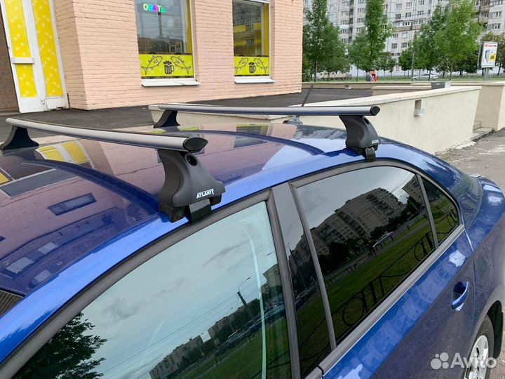 Багажник на крышу Атлант на Skoda Rapid