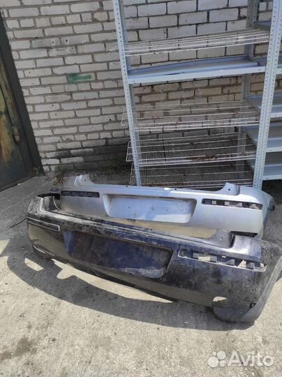 Бампер задний Opel Corsa C 03-06г 73366