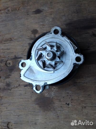 Помпа Ниссан Тиида С 11