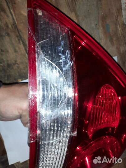 Фонарь задний левый Nissan Almera classic