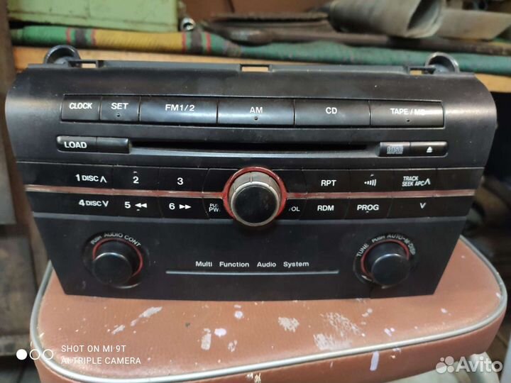 Рабочая Магнитола Mazda Axela 2003 года