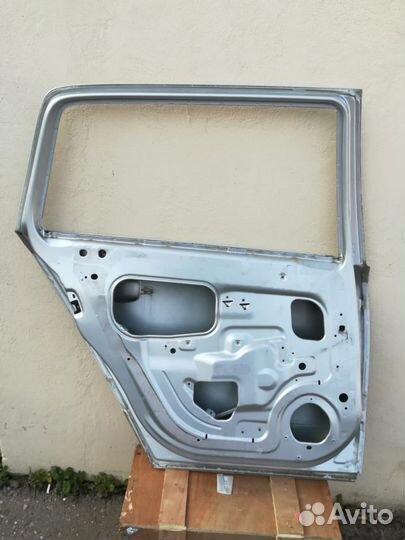 Дверь левая Опель Астра (универсал)