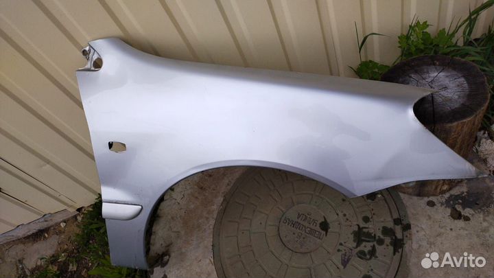 Крыло на Мицубиши ланцер1.6, 9