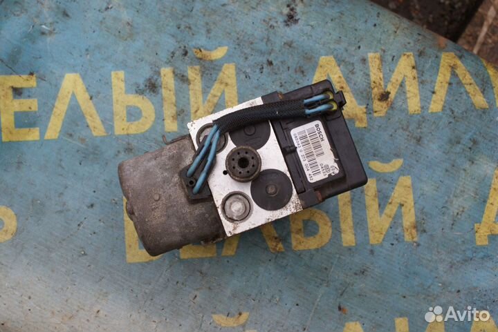 Блок насос ABS Nissan Almera N16