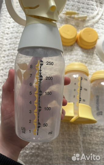 Молокоотсос medela электрический