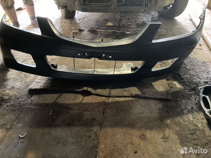 Бампер передний mazda familia2001 год