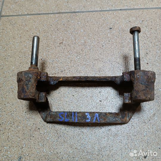 Скоба суппорта задняя левая subaru legacy 2