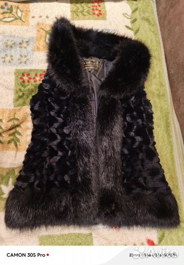Жилетка меховая женская 48