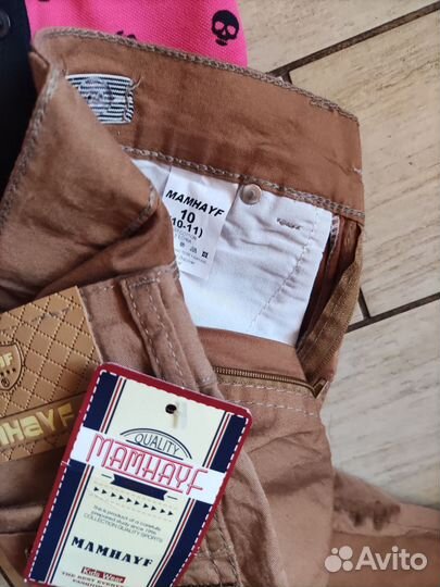 Костюм (поло + удлиненные шорты) новый 10 лет