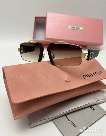 Солнцезащитные очки Miu Miu женские