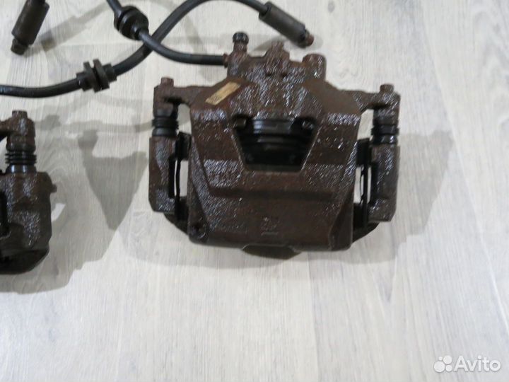 Суппорт передний Chevrolet Cruze