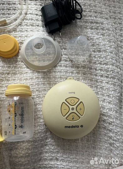 Молокоотсос medela электрический