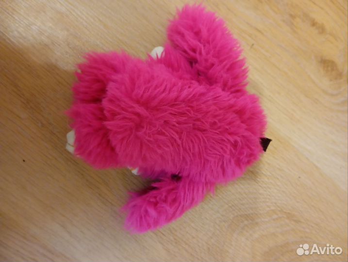 Розовый плюшевый заяц