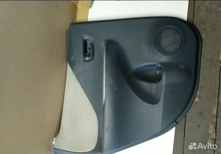 Обшивка двери задняя левая Toyota Ractis
