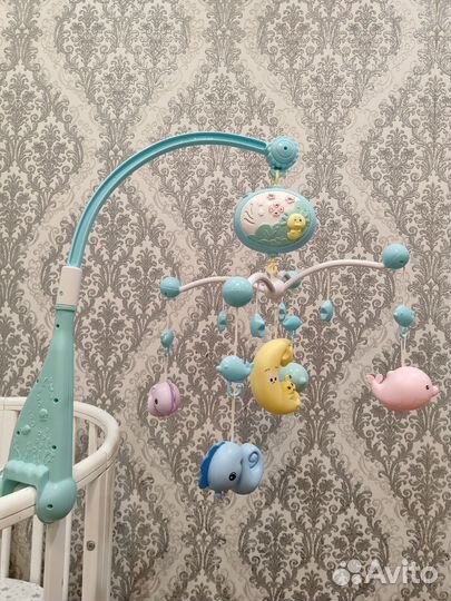 Детский мобиль в кроватку музыкальный