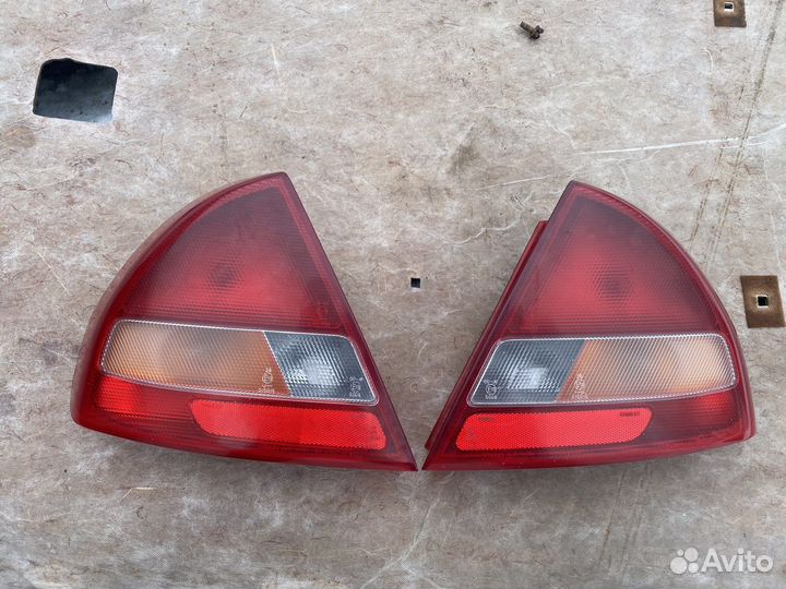 Фонарь левый правый Mitsubishi Lancer 6 Лансер VI