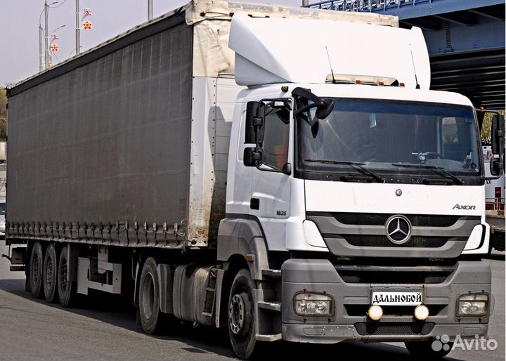 Водитель дальнобойщик категории Е