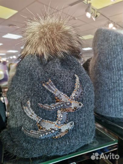 Помпоны енот