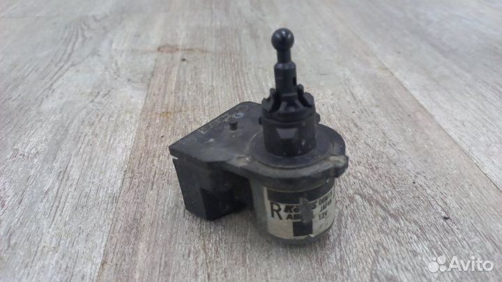 Моторчик корректора фары Cadillac Srx FFN 2010