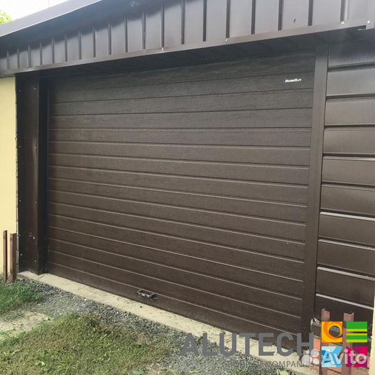 Секционные ворота для гаража alutech