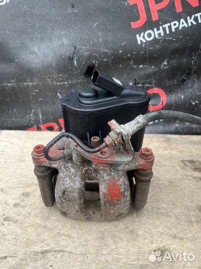 Суппорт задний левый Volkswagen Passat B6