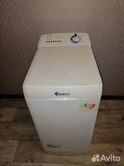 Стиральная машина с вертикальной загрузкой