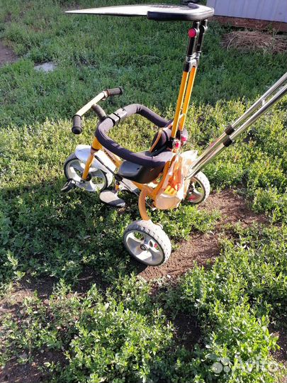 Детский трехколесный велосипед коляска