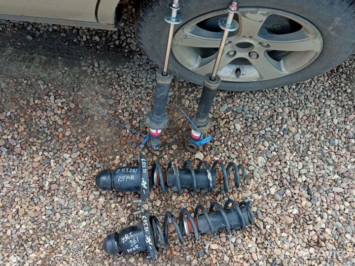 Стойки задние tokico для allion, premio, corolla