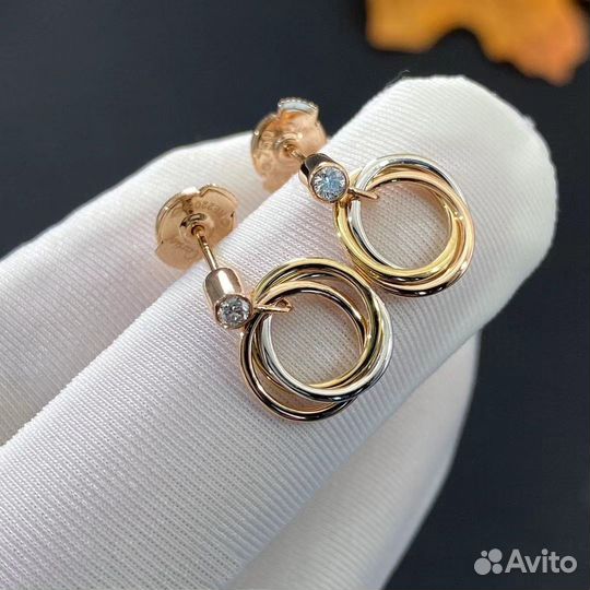 Золотые серьги Cartier Trinity 0,04ct