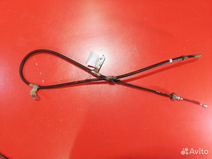 Трос стояночного тормоза левый Hyundai Solaris RB