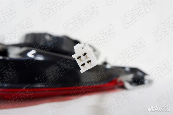 Фонарь левый задний в крышку багажника 560014