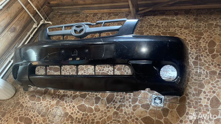Передний бампер мазда трибют