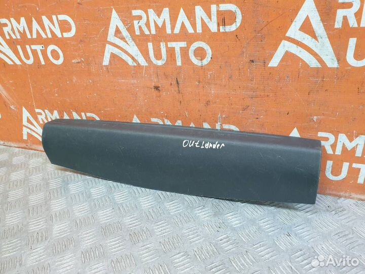 Обшивка двери багажника верхняя Mitsubishi