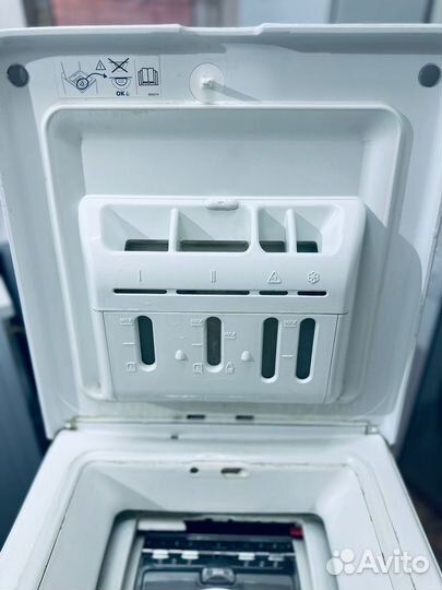 Вертикальная стиральная машина Brandt с сушкой