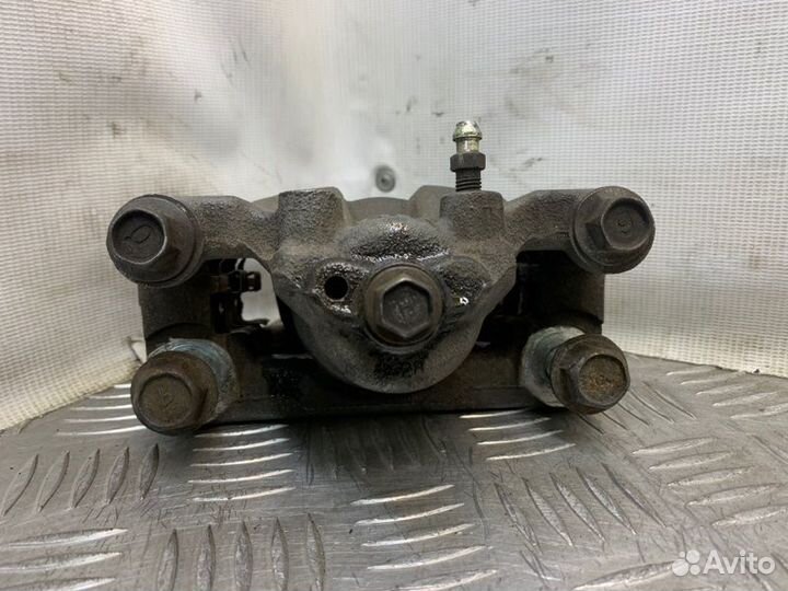 Суппорт тормозной задний левый Nissan X-Trail T31