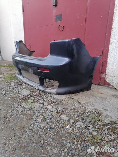 Бампер lancer 10 с выхлопной системой