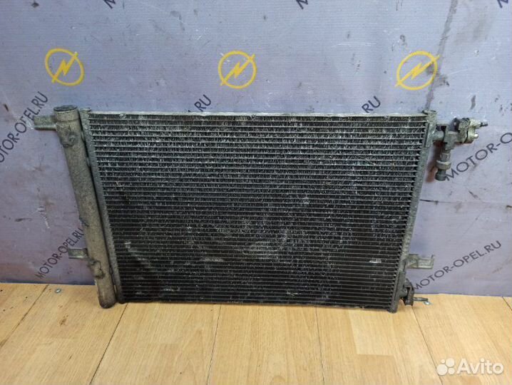 Радиатор кондиционера Opel Astra J A16XER 2009