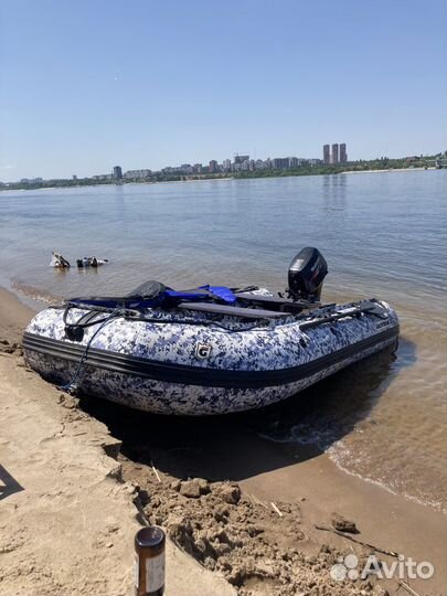 Лодка с мотором и прицепом