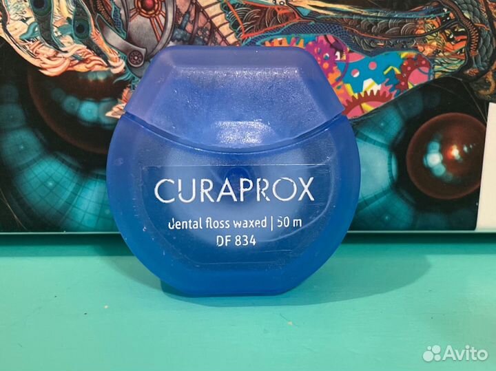 Зубная нить dental floss waxed 834 50 м. Curaprox