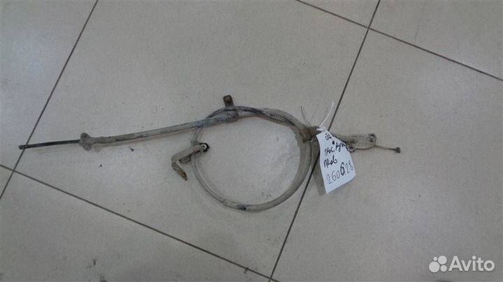 Трос стояночного тормоза правый Daihatsu Storia 1