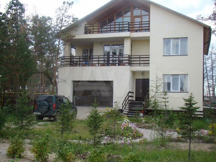 Коттедж 347 м² на участке 11,5 сот.