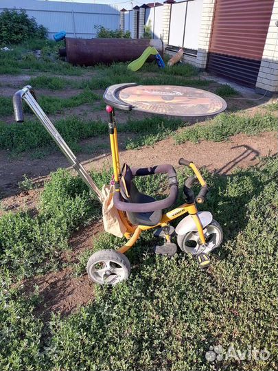 Детский трехколесный велосипед коляска