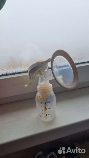 Молокоотсос medela ручной