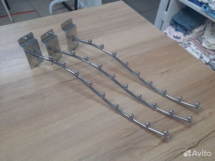 Кронштейн и крючки для эконом панелей