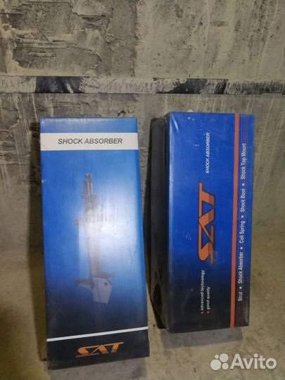 Стойки переднии Мицубиси, ланцер